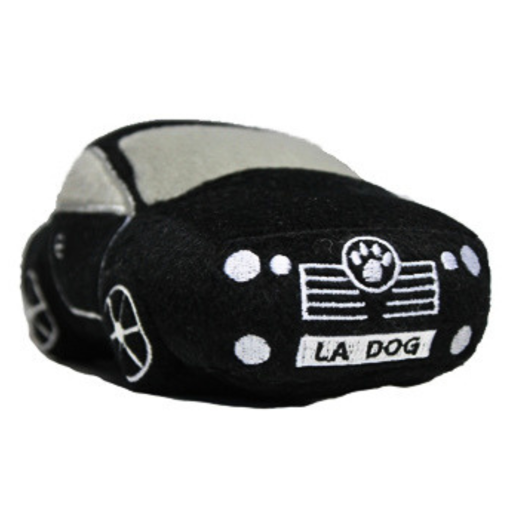 Coco & Pud - Furcedes plush dog toy shaped like a black car with white embroidered details, including a front grille with a paw print emblem, a license plate reading 'LA DOG' - Haute Diggity Dog