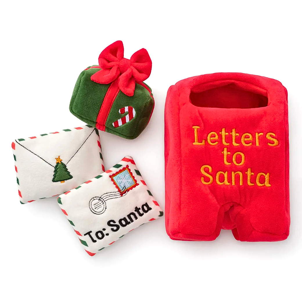Coco & Pud - Letters To Santa Interactive Snuffle Dog Toy. A Christmas-themed plush toy set, featuring a red plush mail box with yellow embroidered text 'Letters to Santa,' a green plush gift box with a red bow and candy cane, and two white plush mailer envelopes with red and green stitched borders and 'To: Santa' embroidery - The Foggy Dog