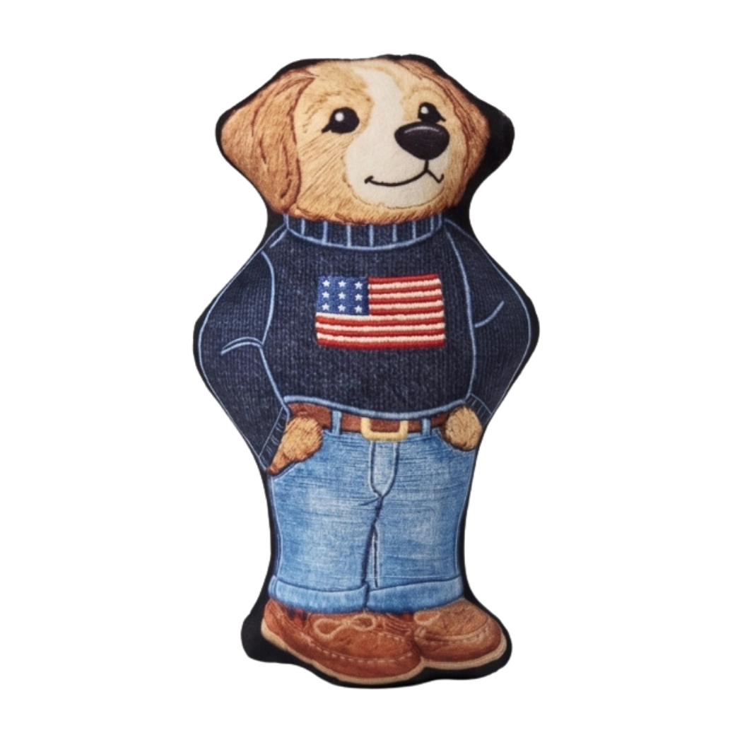 Coco & Pud - Ruff Lauren Teddy Dog Toy. A plush Teddy-shaped dog toy wearing a navy blue sweater with an American flag patch, blue jeans, and brown shoes- Haute Diggity Dog