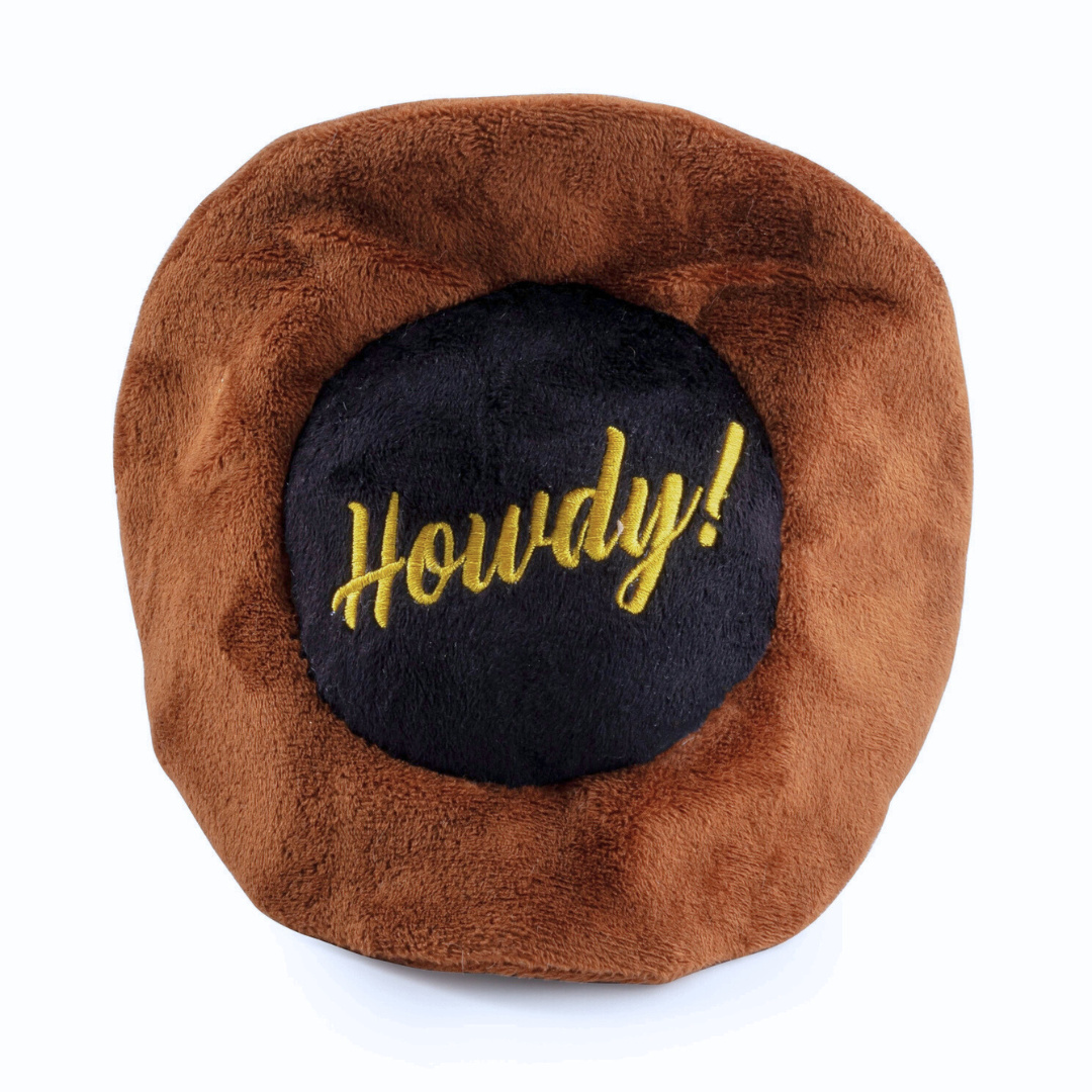 Coco & Pud Brown plush cowboy hat dog toy underside view with 'Howdy!' embroidery on a white background - Haute Diggity Dog