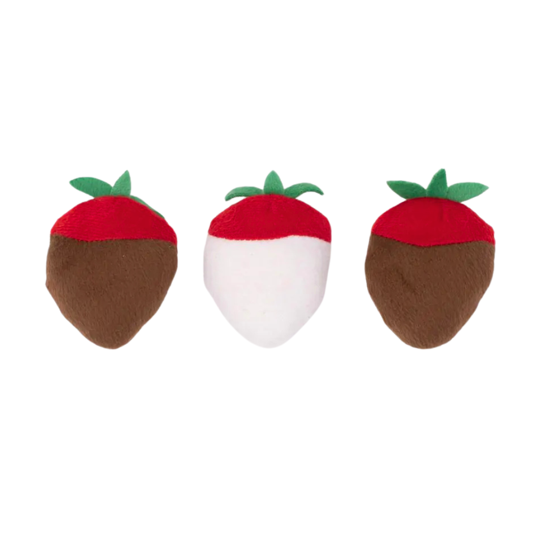 Coco & Pud Three strawberry-shaped dog toys which represent being dipped in chocolate  and green stems -Zippy Paws