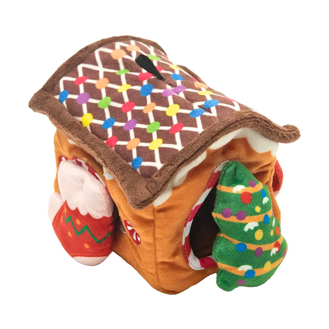 Coco & Pud Hide & Seek Gingerbread house Christmas plush interactive dog toy with candy cane, Christmas stocking and Christmas Tree mini toys inside angle view - Snug Arooz