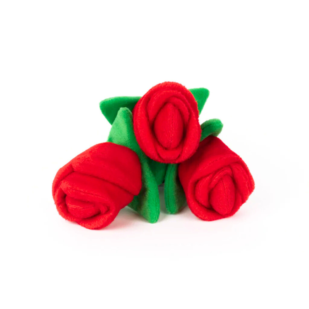 Coco & Pud Red rose-shaped dog toy with green stem and black sheath on a white background front view - Zippy Paws