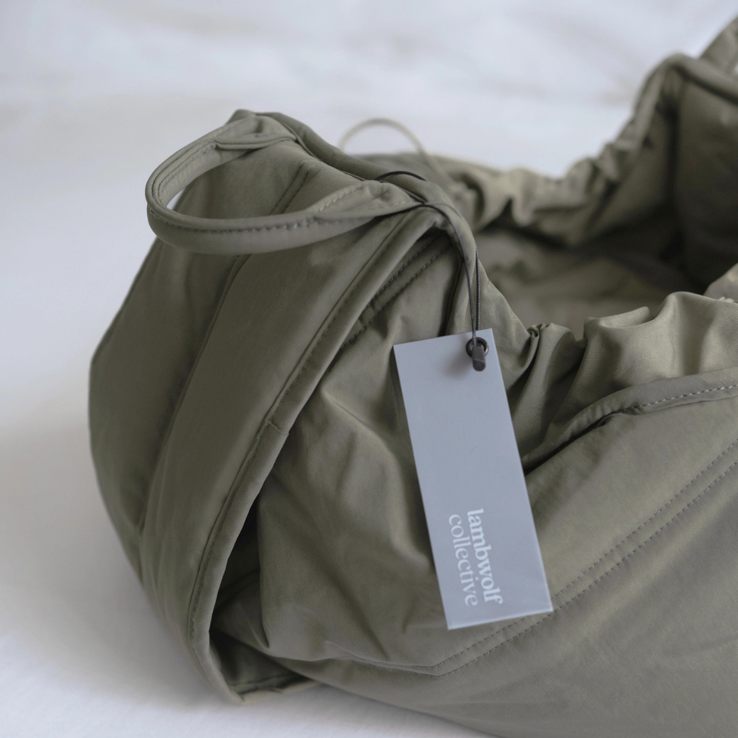 Coco & Pud - Olla soft pet carrier in olive green showing fabric detail -Lambwolf Collective