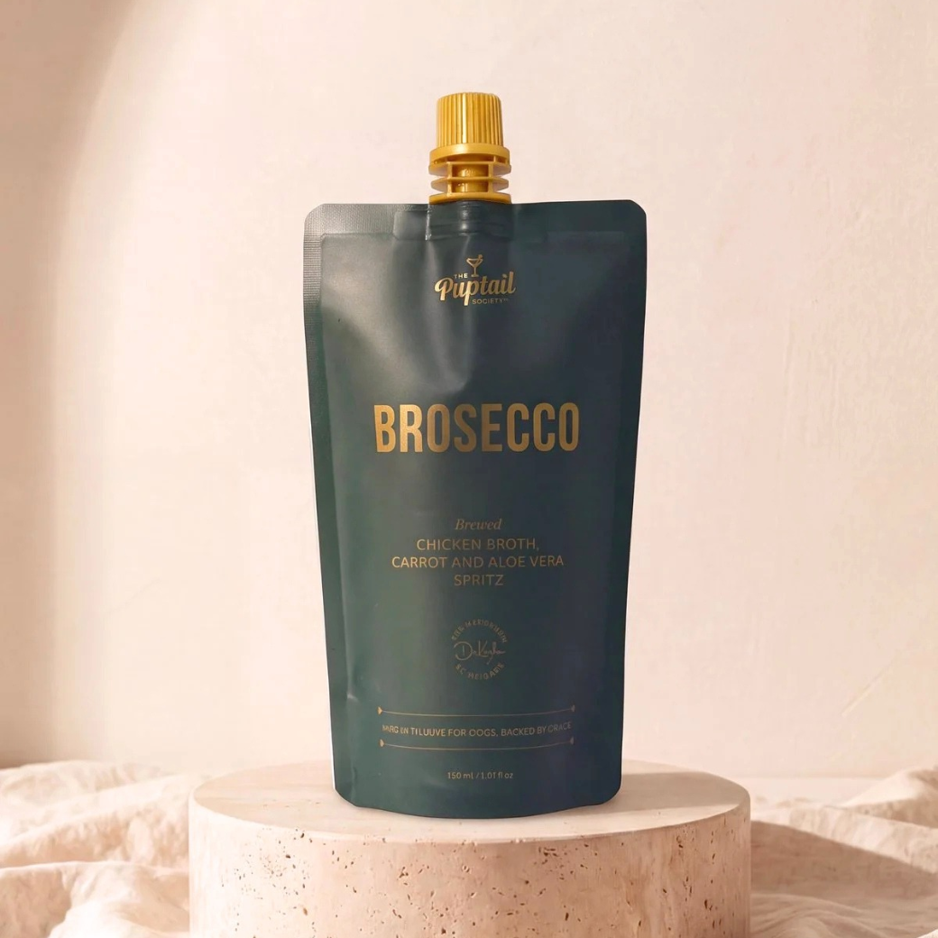 Coco & Pud - Brosecco golden chicken broth and sweet carrot dog tonic/ mocktail - Puptail Society