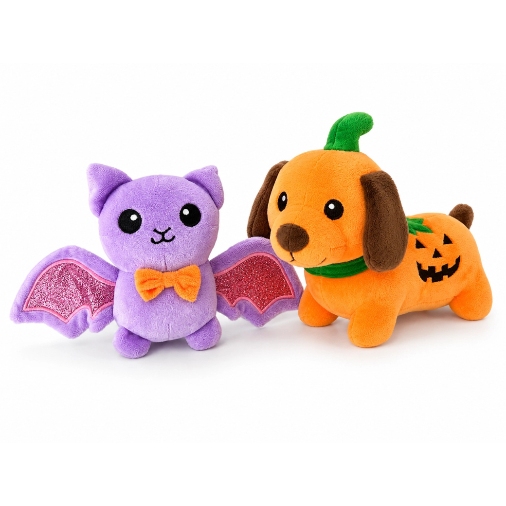 Coco & Pud- Two Spooky Friends Halloween Dog Toys-  A purple bat with glittery pink wings and an orange bow tie, and an orange dachshund wearing a green pumpkin patch and green collar - Pet London
