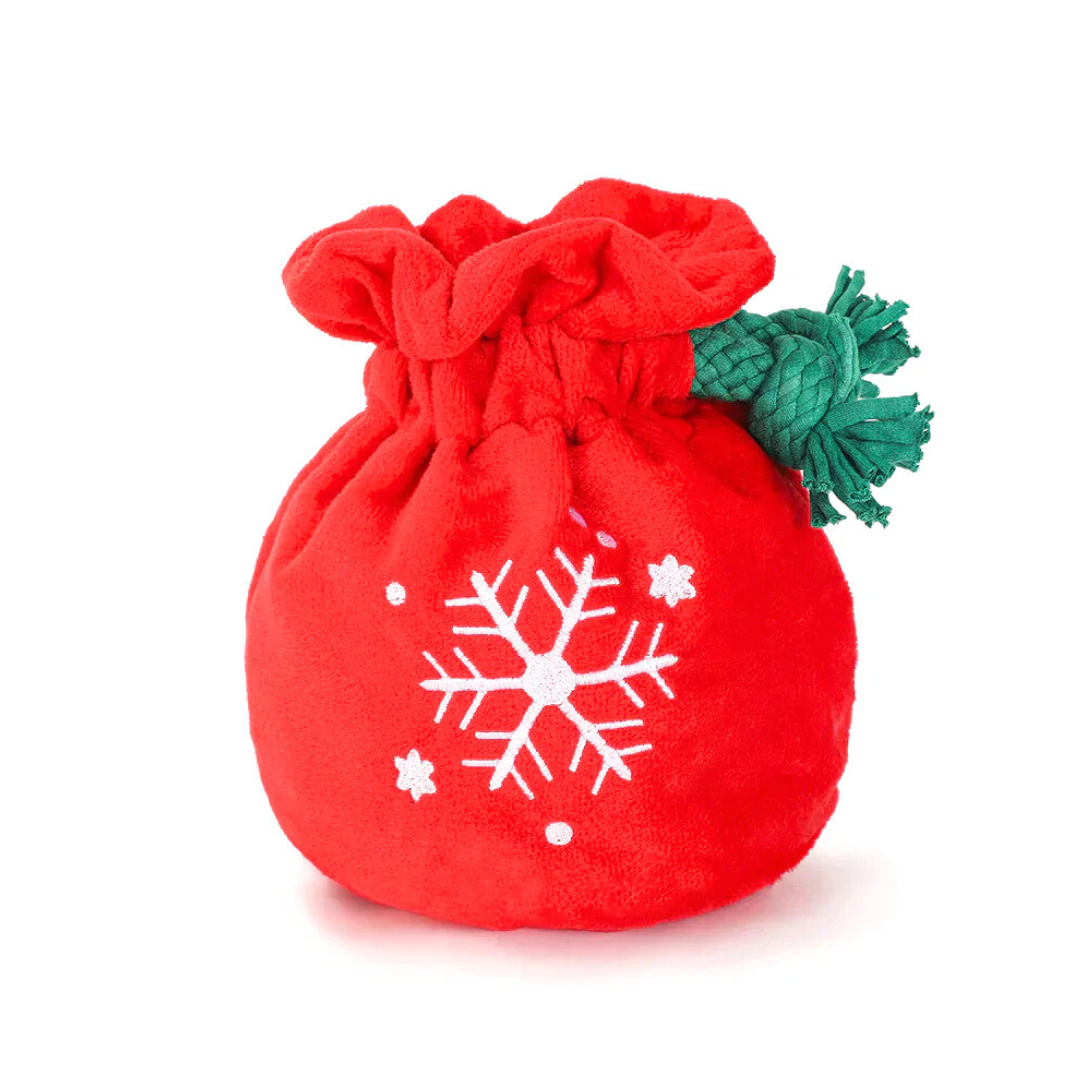 Coco & Pud red drawstring bag with a snowflake design and green rope tied interactive dog toy - Hugsmart 