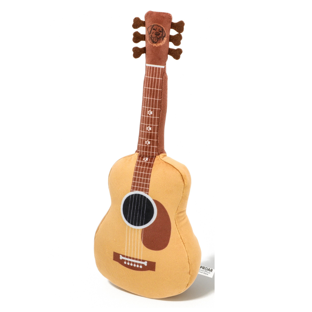 Coco & Pud -Plush acoustic guitar dog toy with a tan body, brown neck and headstock, and black sound hole detail with squeaker and crinkle paper - Puproar
