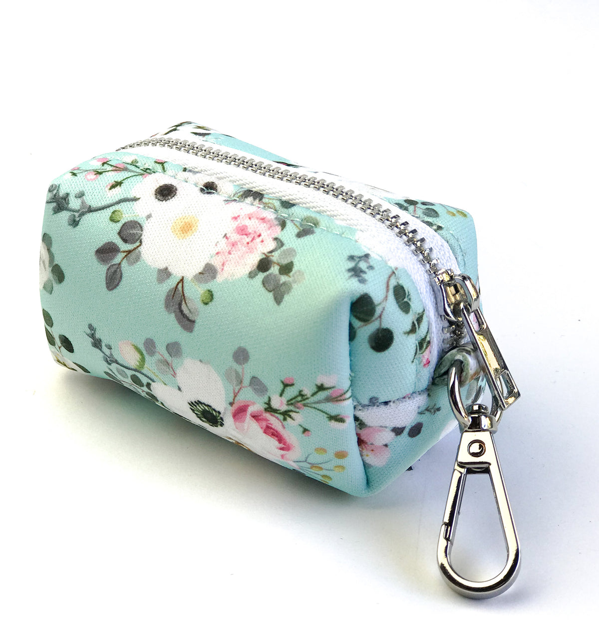 Coco & Pud French Azure Waste Bag Holder - A small zippered pouch with a floral print in mint green, pink, white featuring a silver metal zipper and a silver carabiner clip